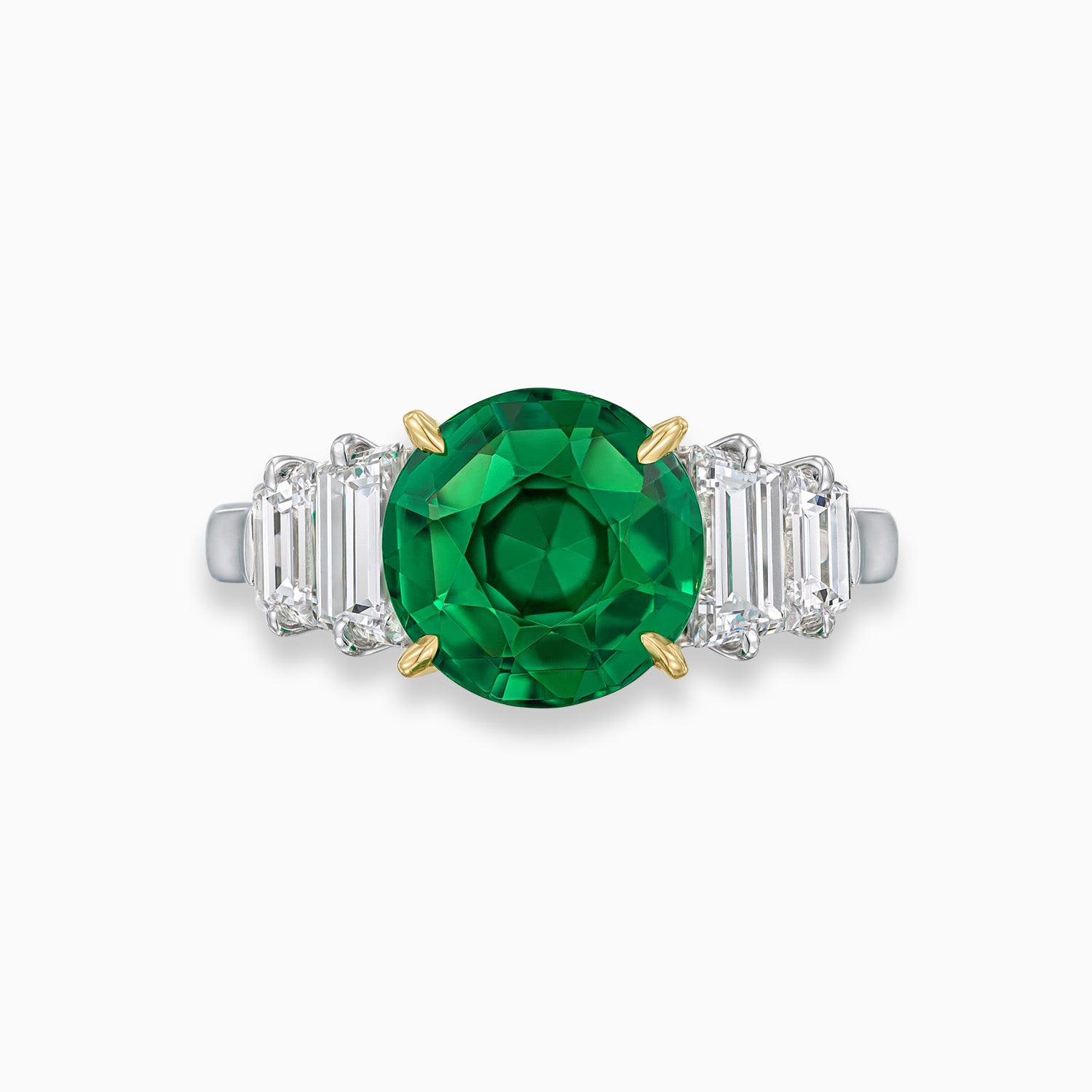 Round Colombian emerald engagement ring with trapezoid diamonds in platinum and 18K yellow gold