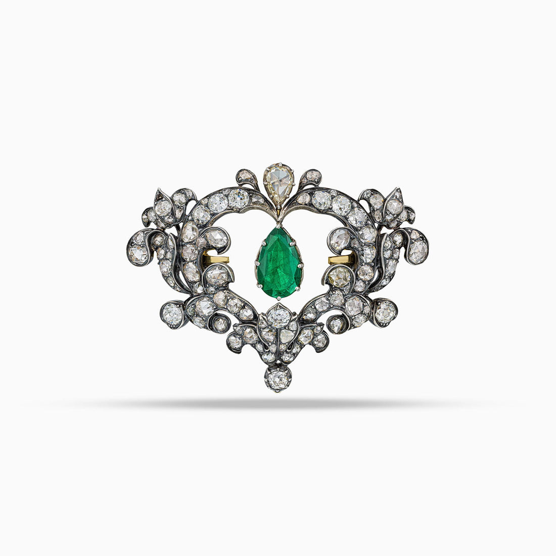 Antique brooch with pear shape Zambian emerald and rose cut diamonds