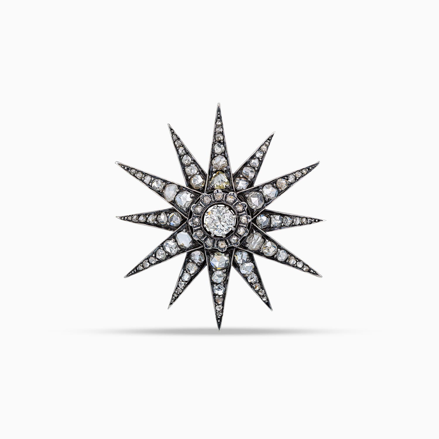 Antique star brooch with old European brilliant and rose cut diamonds in 18K gold