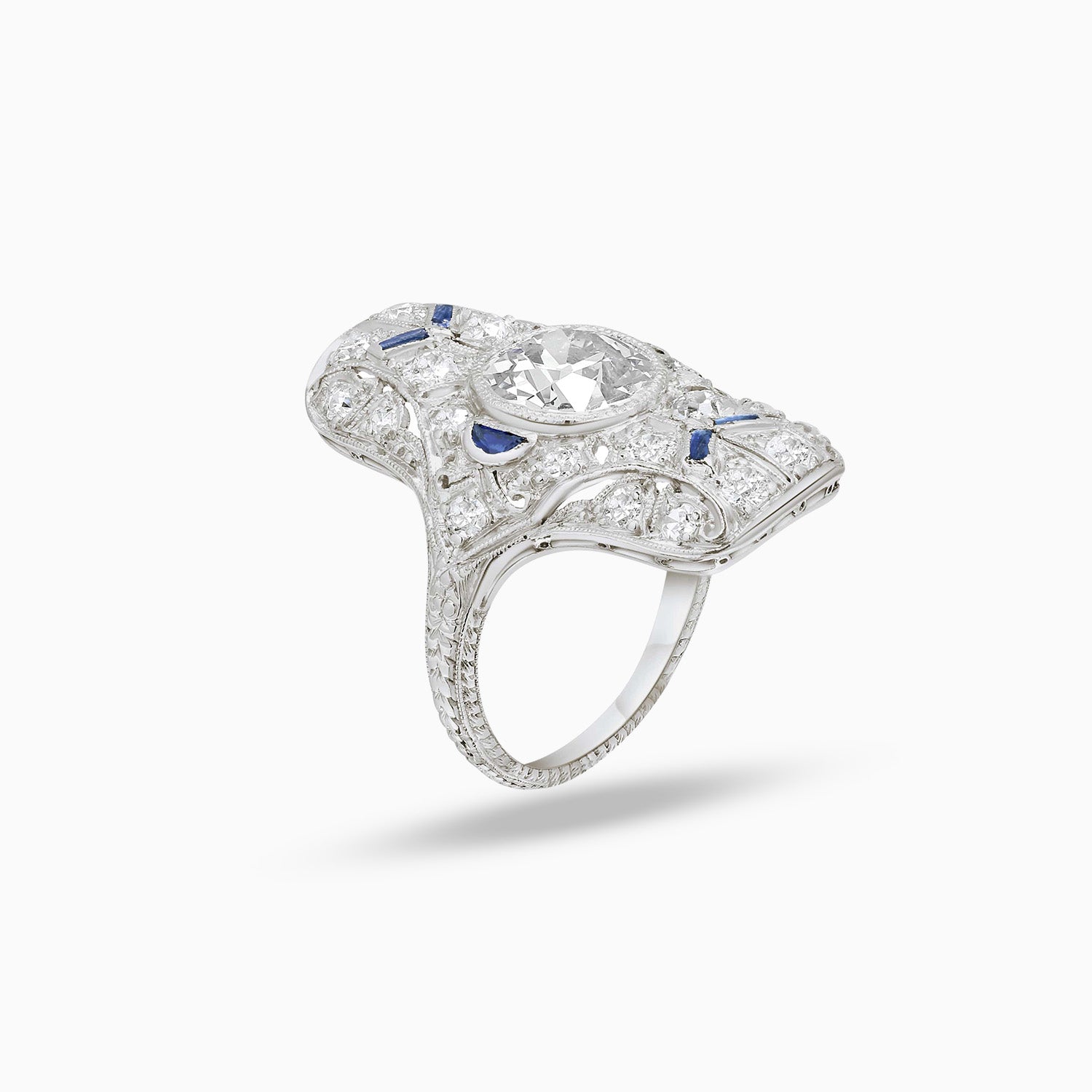 Side view of Art Deco old mine diamond and sapphire ring in 18K white gold