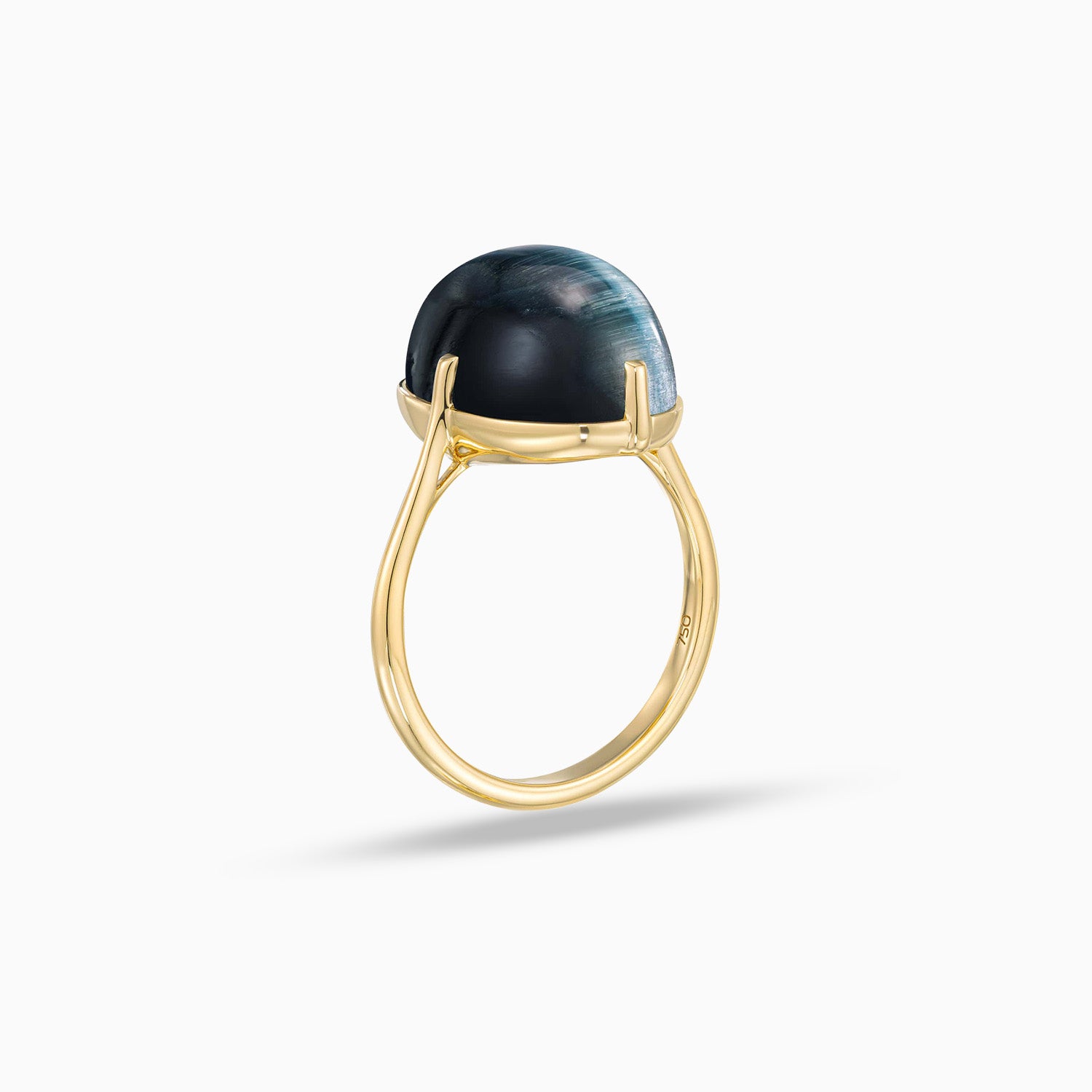 Side view of cabochon cat's eye tourmaline ring in 18K yellow gold