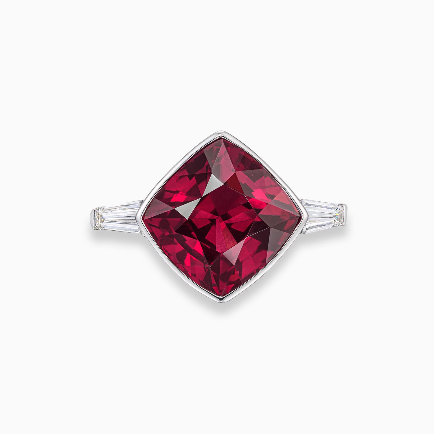 Cushion shape rhodolite garnet ring with tapered baguette diamonds in 18K white gold
