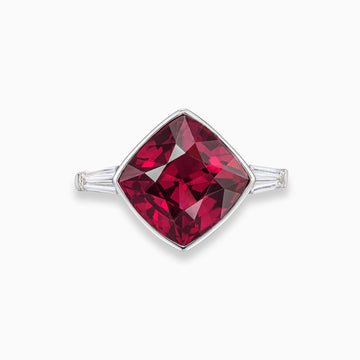 Cushion shape rhodolite garnet ring with tapered baguette diamonds in 18K white gold