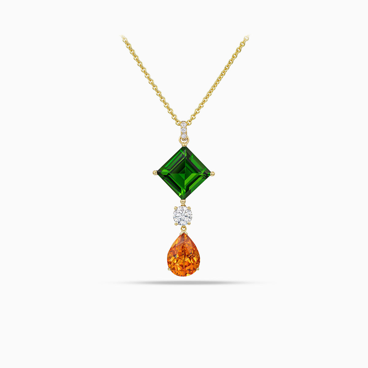 Chrome diopside pendant with round brilliant cut diamond and pear shape hessonite garnet in 18K yellow gold