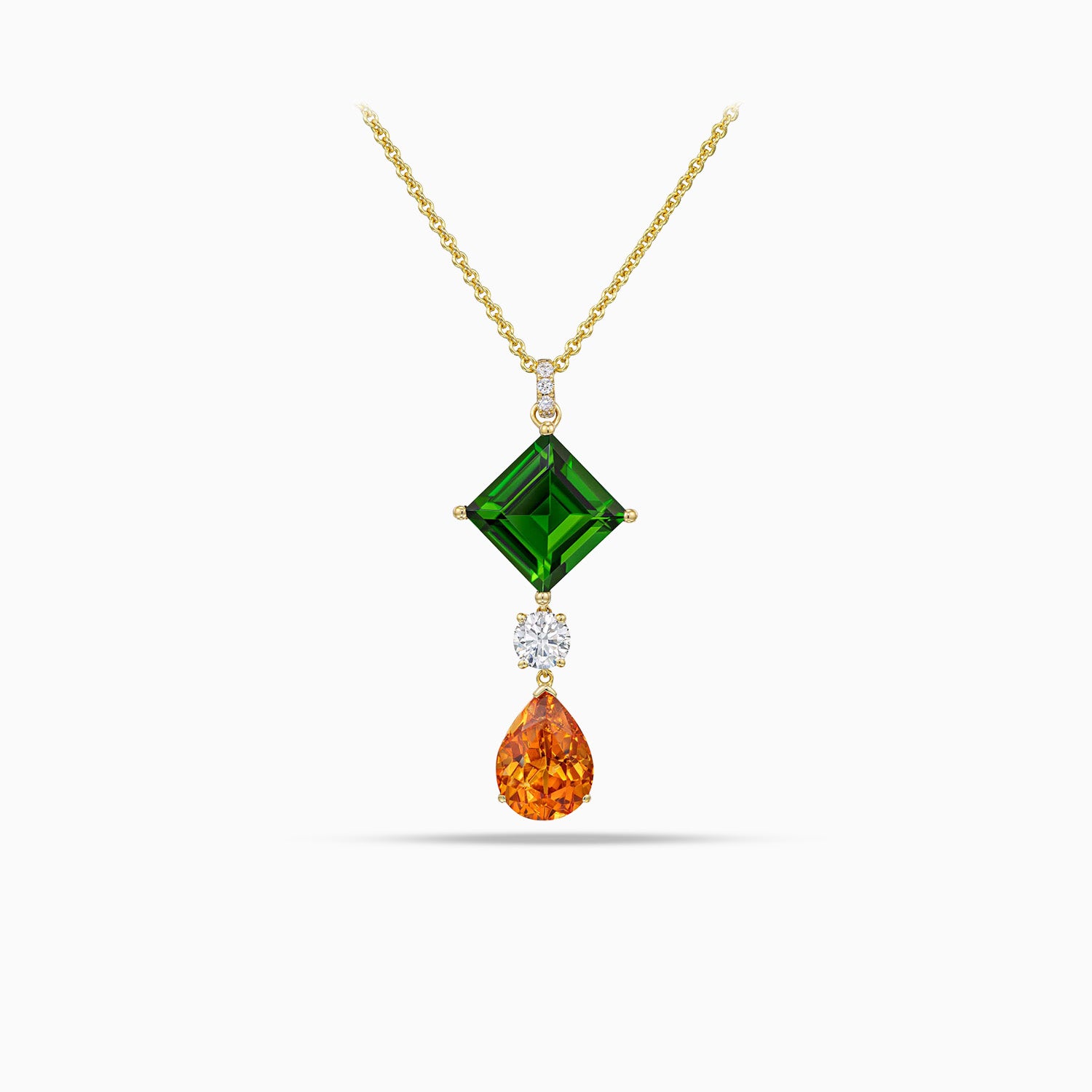 Chrome diopside pendant with round brilliant cut diamond and pear shape hessonite garnet in 18K yellow gold