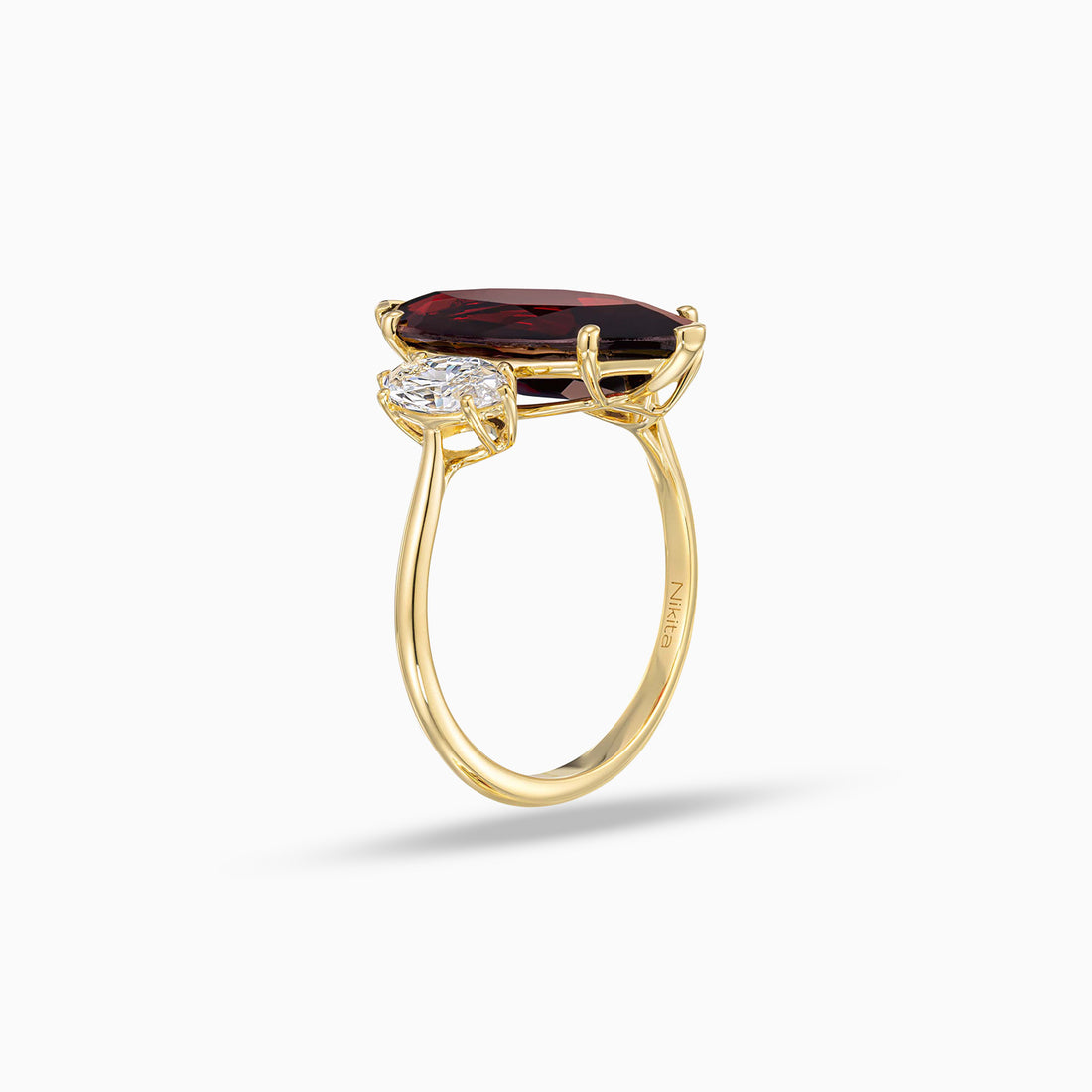 Marquise garnet ring with marquise shape diamonds in 18K yellow gold