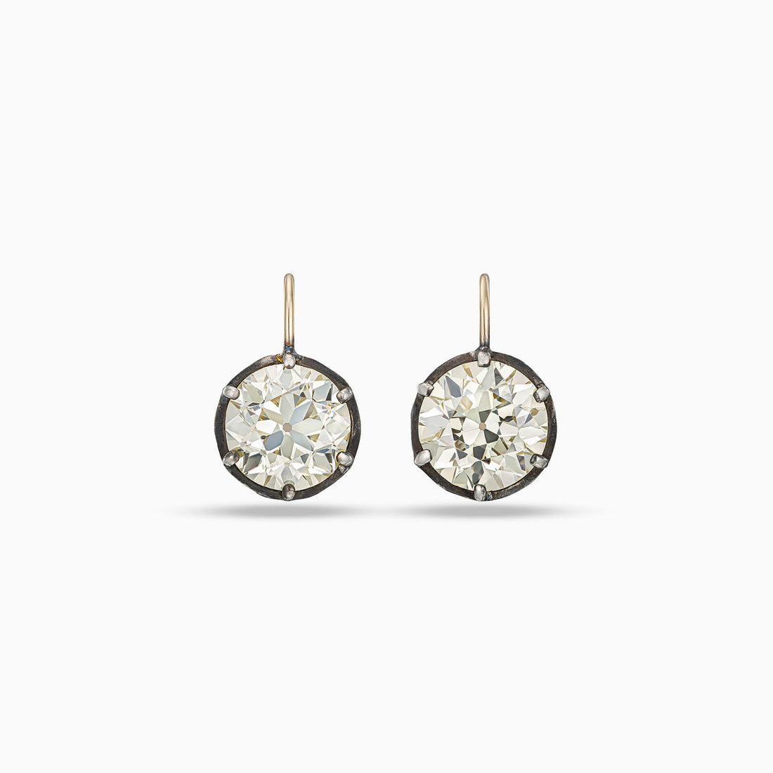 Old European brilliant cut diamond collet earrings in 18K gold