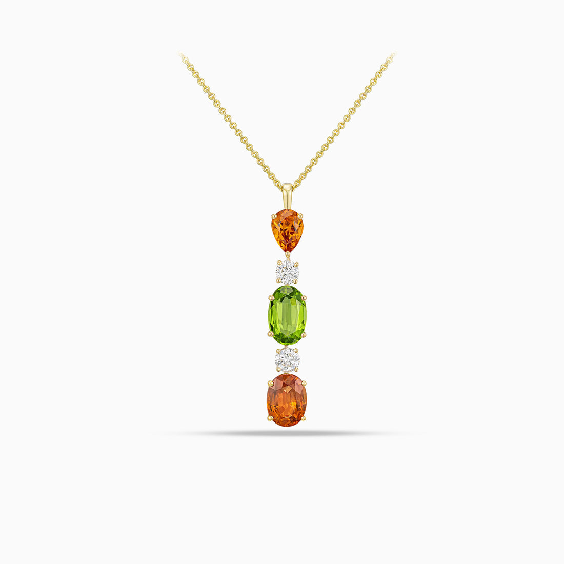 Orange sapphire, peridot and garnet pendant with round brilliant cut diamonds in 18K yellow gold