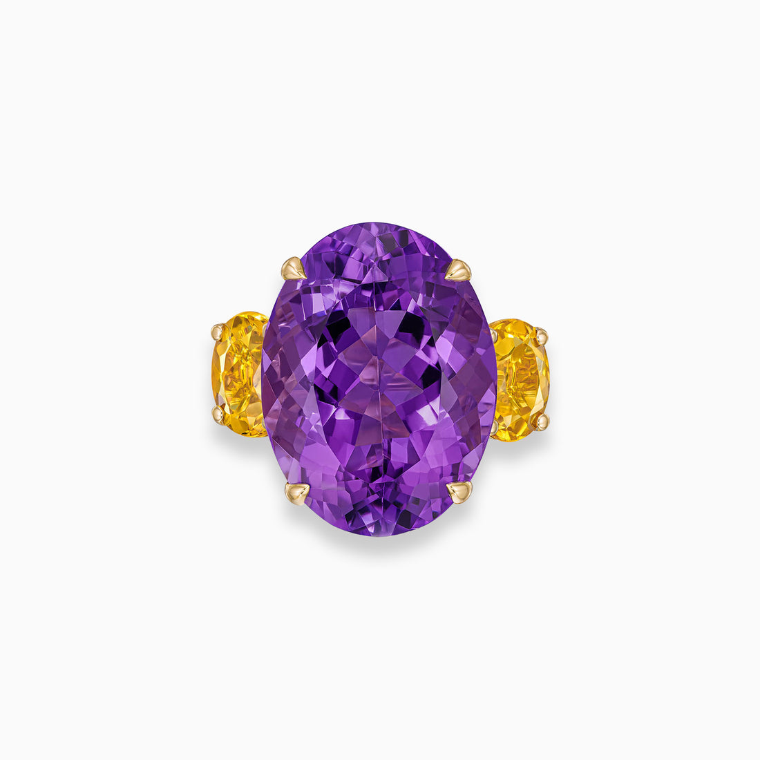 Oval shape amethyst ring with oval beryl side stones in 18K yellow gold