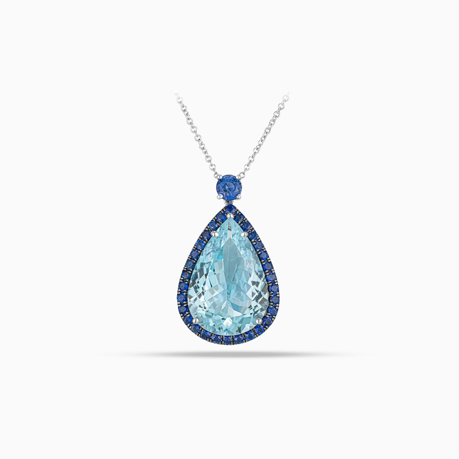 Pear shape aquamarine pendant with blue sapphire accent and sapphire micropavé in 18K white gold