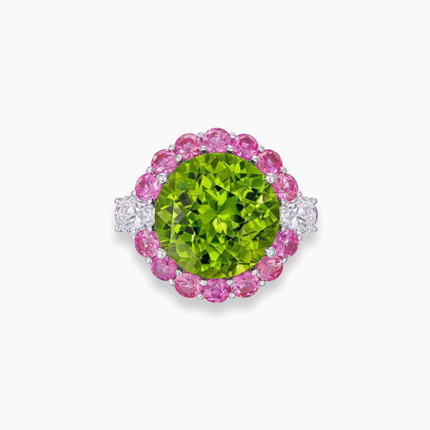 Round peridot ring with pink sapphire halo and pear shape diamond side stones in 18K white gold