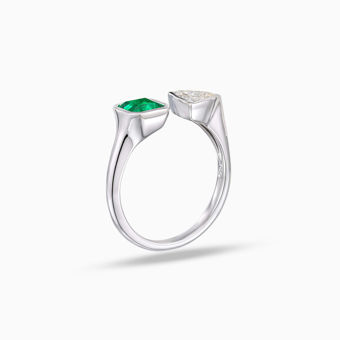 Toi et Moi ring with square cut emerald and trillion shape diamond in 18K white gold